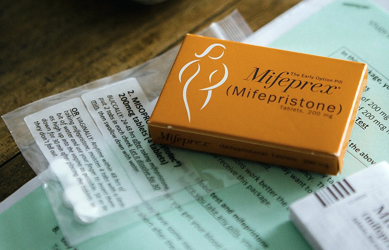 File photo/Michelle Mishina-Kunz/The New York Times / A package of mifepristone, the first pill used in the two-drug medication abortion regimen, is shown in Honaunau, Hawaii, on June 28, 2019.