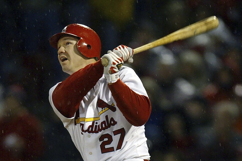 FILE - St. Louis Cardinals Scott Rolen watches his two-run home run off Houston Astros pitcher Chad Harville in the fifth inning during Game 2 of the National League Championship Series at Busch Stadium in St. Louis, Thursday, Oct. 14, 2004. Rolen could become just the 18th third baseman elected to baseball's Hall of Fame, the fewest of any position. Rolen, Todd Helton and Billy Wagner are the leading contenders in the Baseball Writers' Association of America vote announced Tuesday, Jan. 24, 2023.(AP Photo/Sue Ogrocki, File)