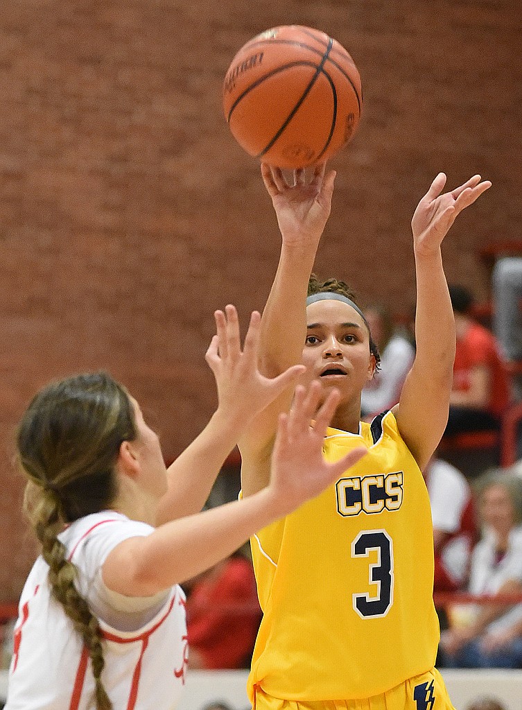 Staff photo by Matt Hamilton / Baylor (4) Bella White defends as CCS (3) Aubriyana Camp puts up a shot during their game at Baylor on Tuesday, January 24, 2023.