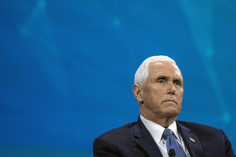 File photo Hiroko Masuike/The New York Times / Former Vice President Mike Pence is shown at a conference in New York on Nov. 30, 2022. Aides to former Pence found a small number of documents with classified markings at his home in Indiana during a search last week, according to a Pence adviser.