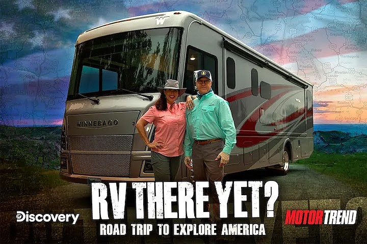 Contributed photo by RV There Yet? / Patrice and Kevin McCabe, from left, stand in front of their Winnebago RV they travel the country in to produce their television show "RV There Yet?" on Discovery Channel.