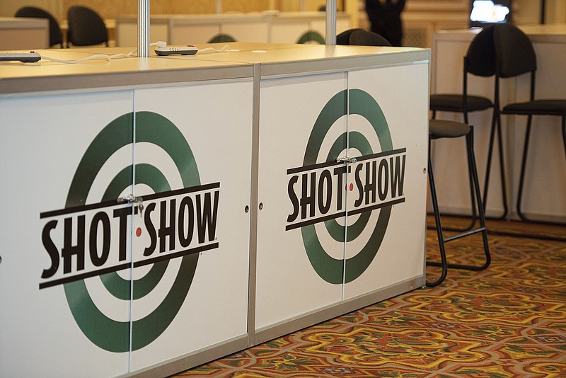AP file photo by Lisa Marie Pane / This year's SHOT Show in Las Vegas boasted more than 2,000 booths spread over 800,000 square feet, and "Guns & Cornbread" columnist Larry Case felt like he covered its 14 miles of aisles twice every day.