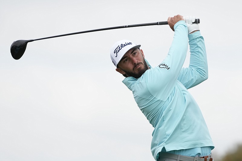 AP photo by Gregory Bull / Max Homa watches his tee shot on the second hole of the South Course at Torrey Pines during the final round of the PGA Tour's Farmers Insurance Open on Saturday in San Diego.