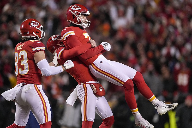 AP photo by Jeff Roberson / Kansas City Chiefs kicker Harrison Butker is lifted in the air after making a 45-yard field goal near the end of the team's 23-20 win against the visiting Cincinnati Bengals in the AFC championship game Sunday night.