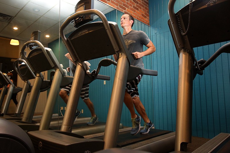 Staff Photo / Ben Frieberg runs on a treadmill at the Sportsbarn in 2019.