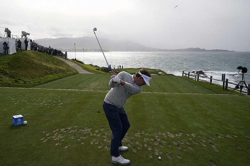 AP photo by Godofredo A. Vásquez / Chattanooga native Keith Mitchell tees off on the seventh hole at Pebble Beach Golf Links on Saturday. Mitchell was tied for second and two shots off the lead when the third round of the Pebble Beach Pro-Am was halted due to severe wind.