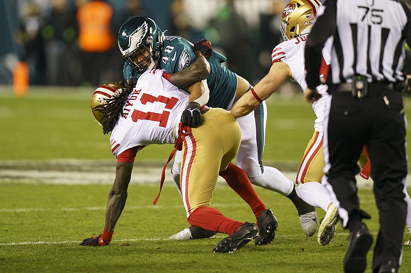 AP photo by Chris Szagola / Philadelphia Eagles linebacker Patrick Johnson gets tied up with San Francisco 49ers wide receiver Brandon Aiyuk during the NFC title game on Jan. 29 in Philadelphia. Johnson, a Chattanooga native who was a high school star at Notre Dame before playing at Tulane University, is in Phoenix with the Eagles as they prepare to take on the Kansas City Chiefs in Super Bowl LVII on Sunday.