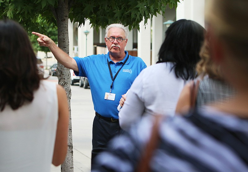 Staff photo / Garry Mac, advocate for Hospice of Chattanooga, talks about the "Before I Die" wall Tuesday, Aug. 15, 2017, during a Senior Network meeting hosted by Hospice of Chattanooga in Renaissance Park in Chattanooga, Tenn.