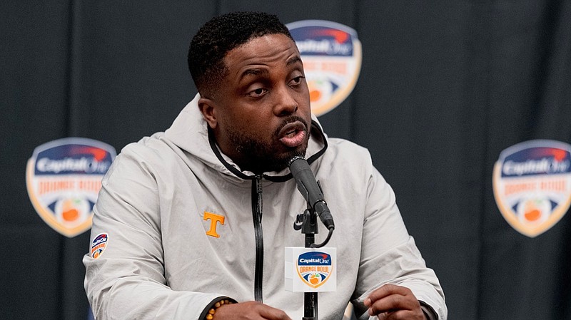 Tennessee Athletics photo / Tennessee defensive coordinator Tim Banks, shown during an Orange Bowl news conference in late December, is nearing his third spring practice with the Volunteers.
