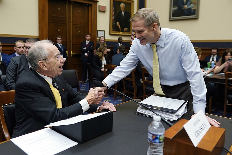 Photo/Carolyn Kaster/The Associated Press / Select Subcommittee on the Weaponization of the Federal Government Chairman Jim Jordan, R-Ohio, shakes hands with Sen. Chuck Grassley, R-Iowa, before the start of a House Judiciary subcommittee hearing on what Republicans say is the politicization of the FBI and Justice Department and attacks on American civil liberties on Capitol Hill on Thursday, Feb. 9, 2023, in Washington.