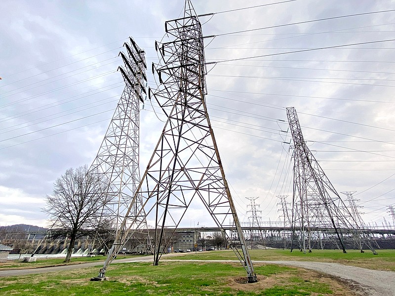 Staff Photo by Robin Rudd / The Tennessee Valley Authority's Chickamauga Dam is seen behind transmission towers Thursday.