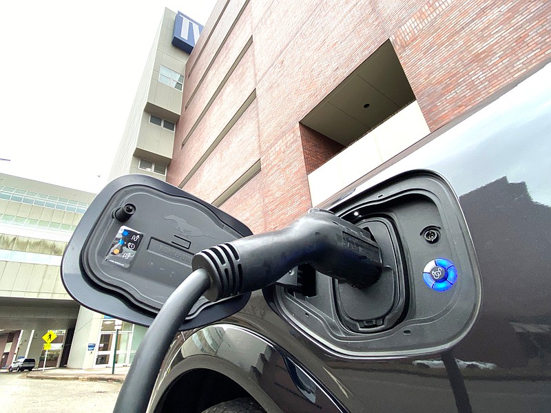 Staff Photo by Robin Rudd / An electric vehicle charges Thursday at the Tennessee Valley Authority's downtown Chattanooga offices.