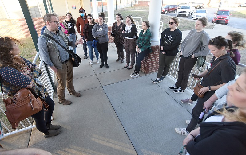 Staff Photo by Matt Hamilton / Aaron Fowles, with the Tennessee Education Association, left, speaks to teachers in January outside a Hamilton County school board work session.