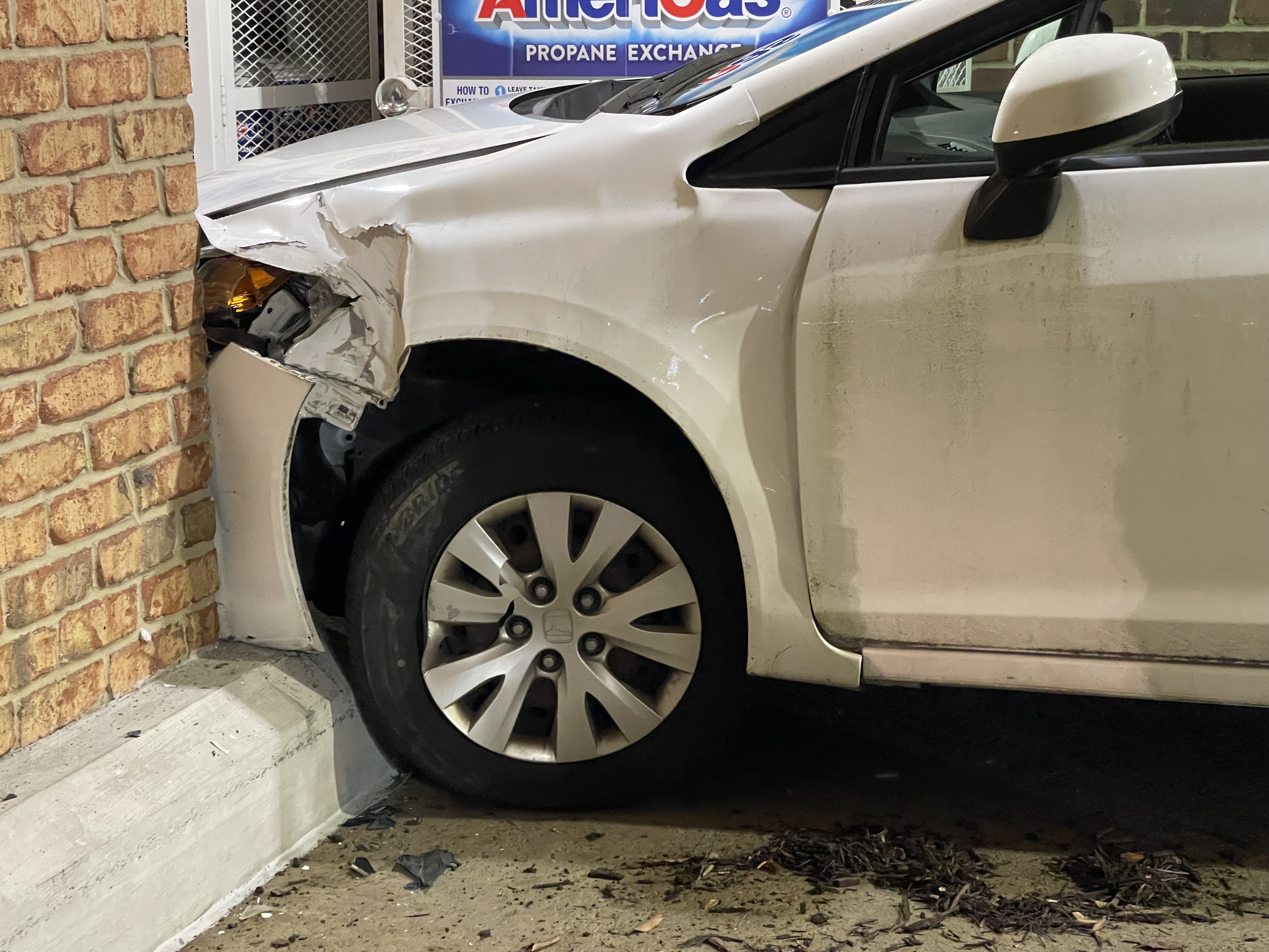 Staff Photo by Jennifer McNally / A car crashed into the Publix grocery store on North Market Street in Chattanooga on Thursday.