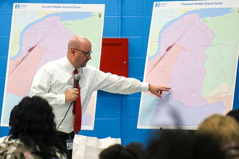 Staff photo by Olivia Ross  / Ben Coulter, Hamilton County Schools project manager, speaks at a meeting at Brainerd High School on Jan. 30 to share school zone maps, answer questions and receive feedback about proposed school rezoning for the 2023-24 school year.