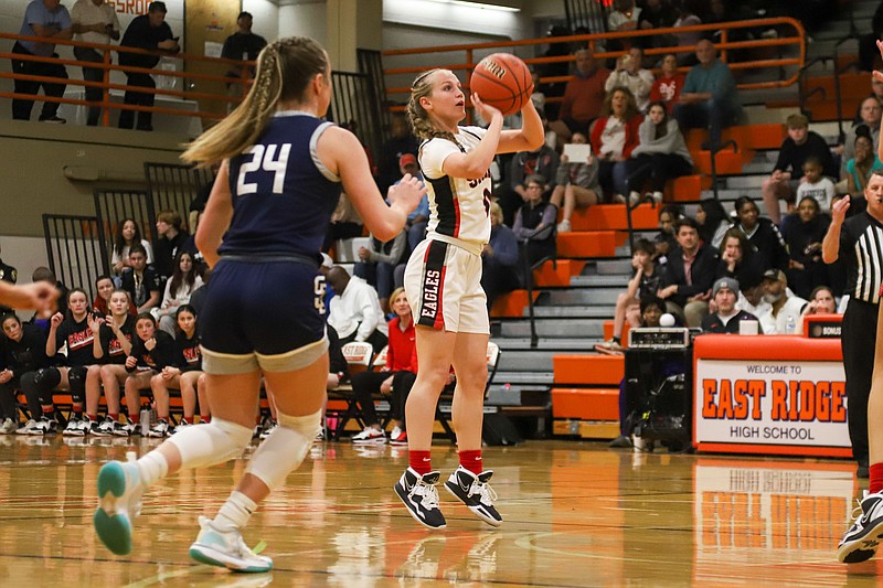 Staff photo by Olivia Ross  / Signal Mountain's Abby Walker (0) shoots. Soddy-Daisy took on Signal Mountain in the District 6-AAA championship game at East Ridge High School on Tuesday, February 21, 2023.