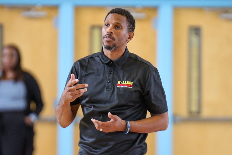 Staff photo by Olivia Ross  / Montrell Besley talks about how his family has been affected by gun violence at a forum at Brainerd High School on June 7.