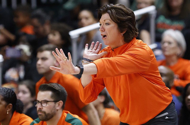 AP photo by Rona Wise / Miami's Katie Meier coaches during a Hurricanes women's basketball game against Notre Dame on Dec. 29 in Coral Gables, Fla.