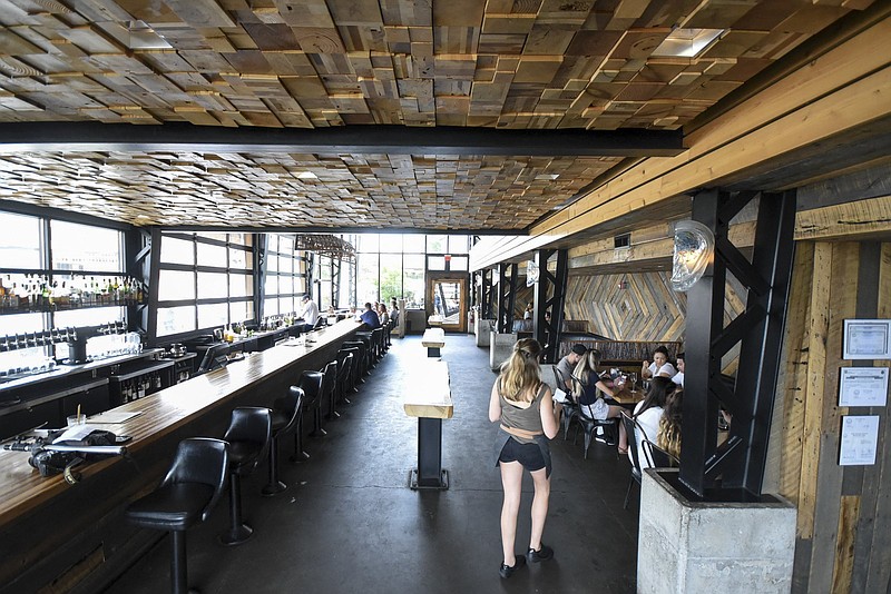 Staff photo / The downstairs interior of the Flying Squirrel is seen in 2019.