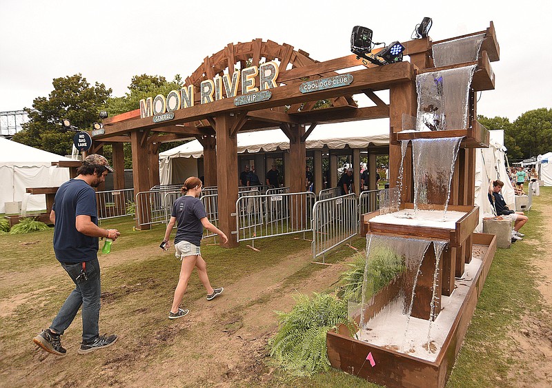 Staff Photo by Matt Hamilton / Guests enter through the main gates Sept. 10 on the first day of the Moon River Music Festival at Coolidge Park. The 2023 event sold out in less than a week.