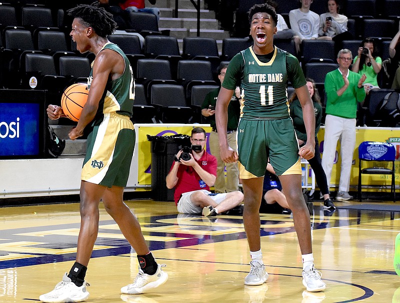 Staff photo by Patrick MacCoon / Notre Dame sophomore Gaas Herman (11) celebrates after DJ Brown's big basket late in the third quarter of a BlueCross Basketball State Championships Division II-A semifinal Thursday at Tennessee Tech University in Cookeville.