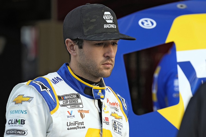 AP photo by Chris O'Meara / NASCAR driver Chase Elliott watches as his crew works on his car during Daytona 500 practice on Feb. 17.