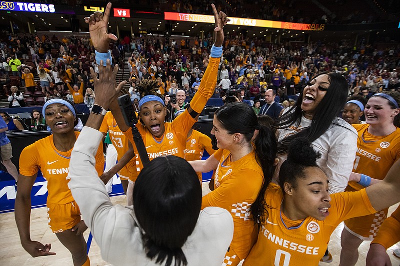 AP photo by Mic Smith / From left, Tennessee seniors Rickea Jackson, Jordan Horston and their teammates celebrate after upsetting LSU 69-67 in the SEC tournament semifinals Saturday night in Greenville, S.C.