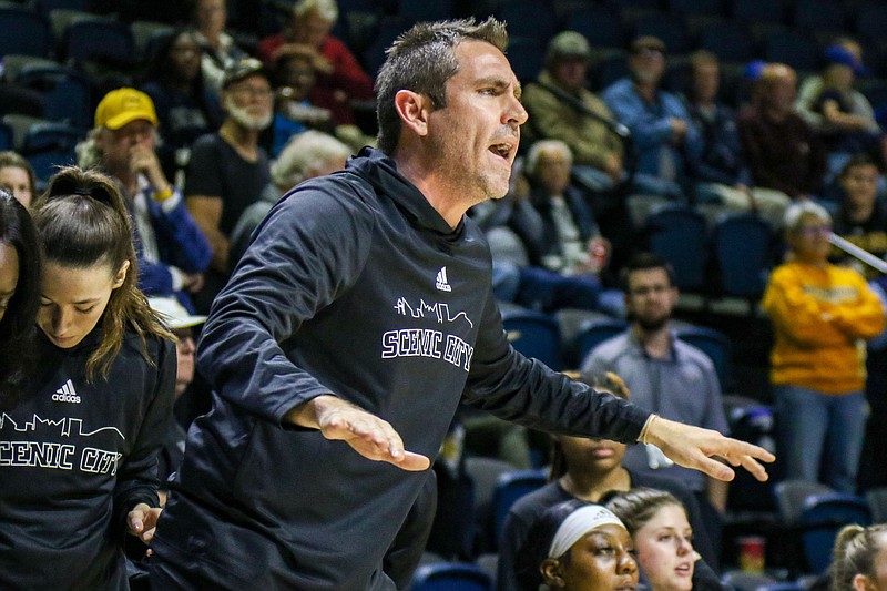 Staff photo by Olivia Ross  / UTC's Coach Shawn Poppie yells from the sidelines. UT Chattanooga women's basketball team took on Samford at home on Thursday, January 12, 2023.