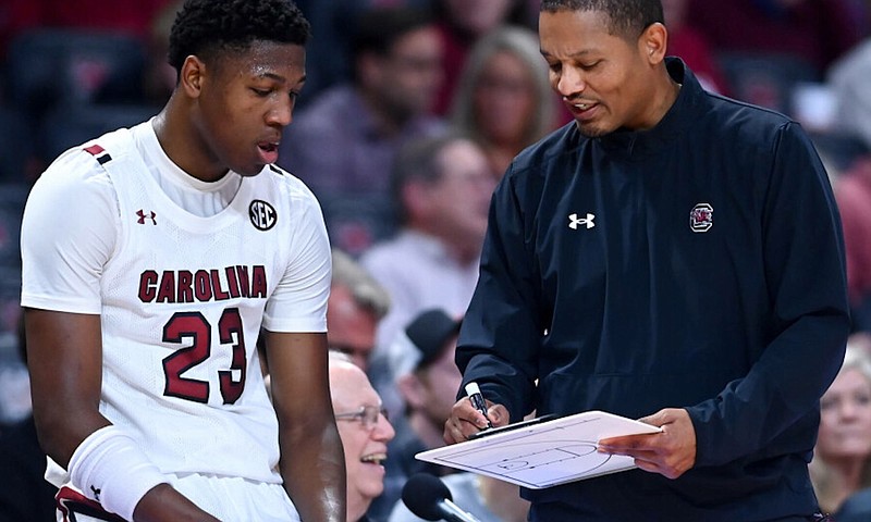 South Carolina Athletics photo / South Carolina first-year basketball coach Lamont Paris goes over a play with five-star freshman forward Gregory "GG" Jackson during a game in Colonial Life Arena.