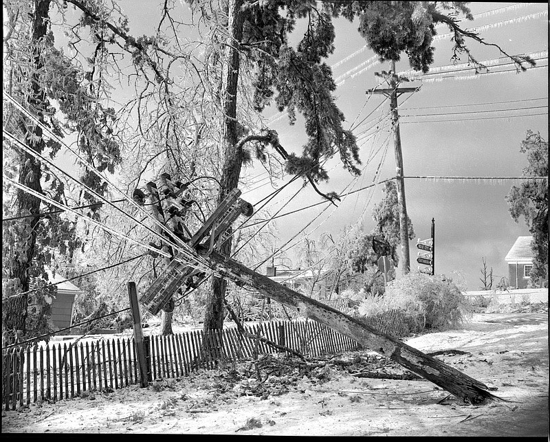 Contributed photo from EPB archives via ChattanoogaHistory.com. / This 1960 photo of downed power lines on Lookout Mountain documents an ice storm that kept many of Chattanooga’s mountain neighborhoods without power for days.