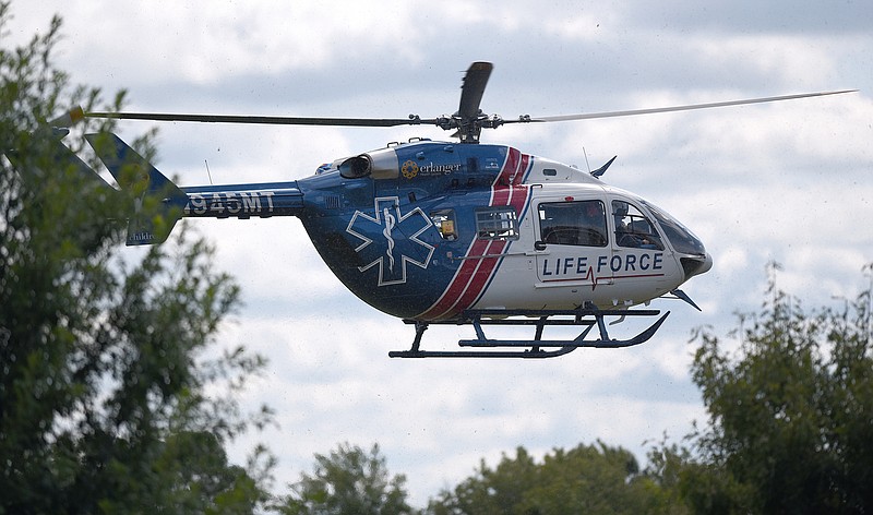 Staff photo by Matt Hamilton / A Life Force helicopter lands at Tyner Academy on Wednesday, Sept. 14, 2022.