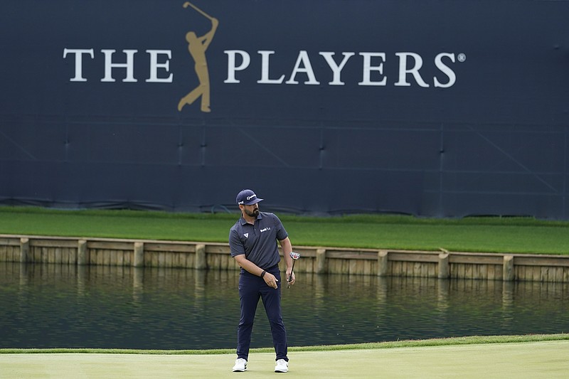AP photo by Eric Gay / Chad Ramey putts on the 18th hole of the Stadium Course at TPC Sawgrass during the first round of The Players Championship on Thursday in Ponte Vedra Beach, Fla.