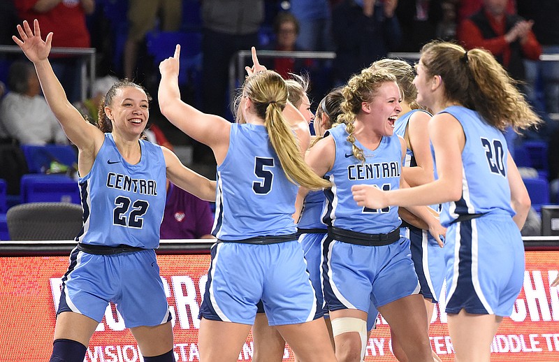 Staff photo by Matt Hamilton / McMinn Central basketball players celebrate their win over Gibson County in the TSSAA Class 2A semifinals at the BlueCross State Championships on Friday in Murfreesboro, Tenn.