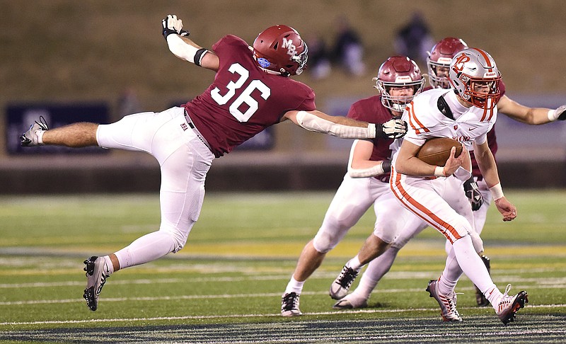 Staff photo by Matt Hamilton / Baylor quarterback Whit Muschamp runs the ball during the Red Raiders' victory against Montgomery Bell Academy in the TSSAA Division II-AAA BlueCross Bowl state title game in December at Finley Stadium.