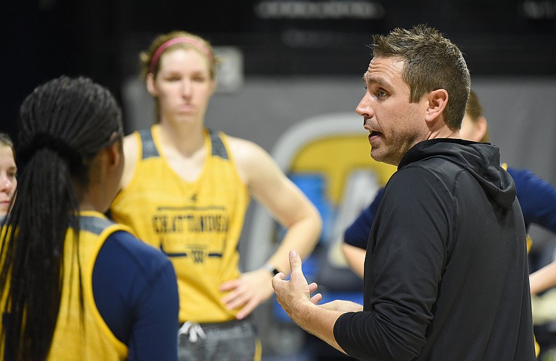 Staff photo by Matt Hamilton / UTC women's basketball coach Shawn Poppie talks to his players during a November practice.