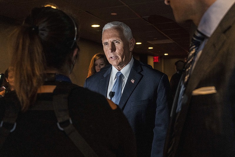 File photo/Hiroko Masuike/The New York Times / Former Vice President Mike Pence speaks to reporters at The New York Times DealBook Summit 2022 at Jazz At Lincoln Center in Manhattan on Nov. 30, 2022.