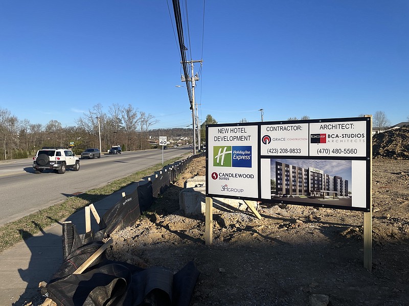 Staff Photo by Dave Flessner / A sIgn Wednesday shows the hotel look and location along Shallowford Road where the 3H Group is planning to build a Holiday Inn Express Candlewood Suites.