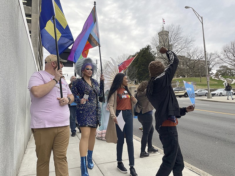 File photo/Jonathan Mattise/The Associated Press / Advocates who opposed a bill that restricted where certain drag shows could take place march from a rally outside of the Tennessee Capitol in Nashville on Feb. 14, 2023, to the Cordell Hull legislative building.