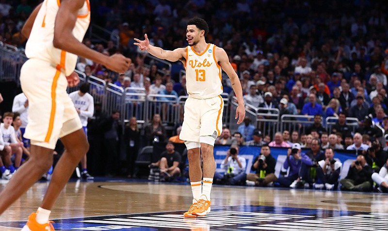 Tennessee Athletics photo / Tennessee senior forward Olivier Nkamhoua celebrates one of his three 3-pointers during Saturday afternoon’s 65-52 whipping of Duke in an NCAA tournament East Region second-round game in Orlando, Fla.