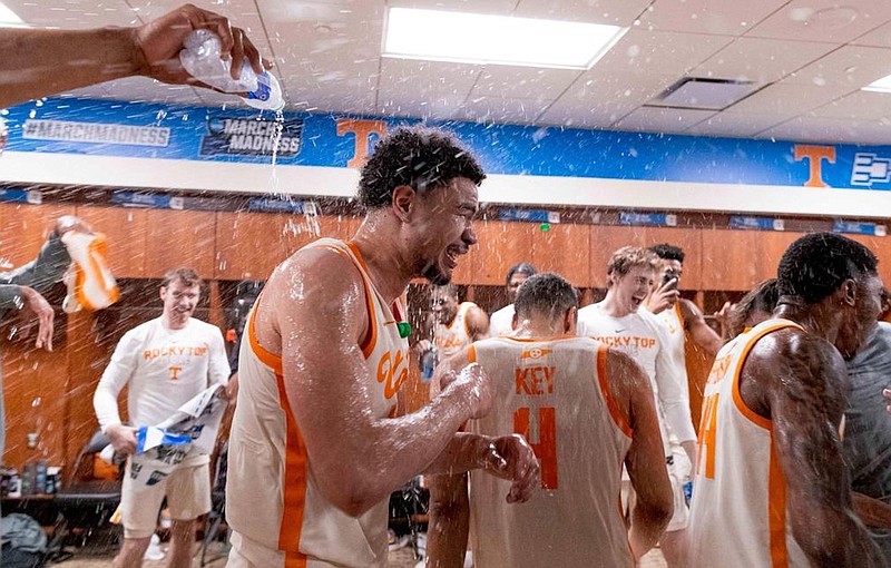 Tennessee Athletics photo / Tennessee senior forward Olivier Nkamhoua finds himself in the middle of some celebratory spray after his 27-point performance in Saturday afternoon’s 65-52 NCAA tournament win over Duke in Orlando, Fla.