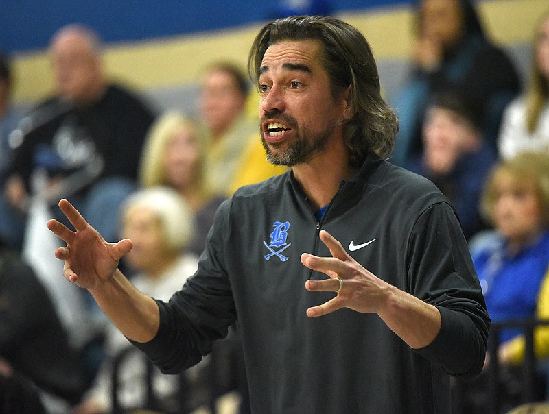 Staff photo by Matt Hamilton / Boyd Buchanan coach Josh Templeton coaches from the sidelines during their game at Arts and Sciences High School on Friday, January 27, 2023.