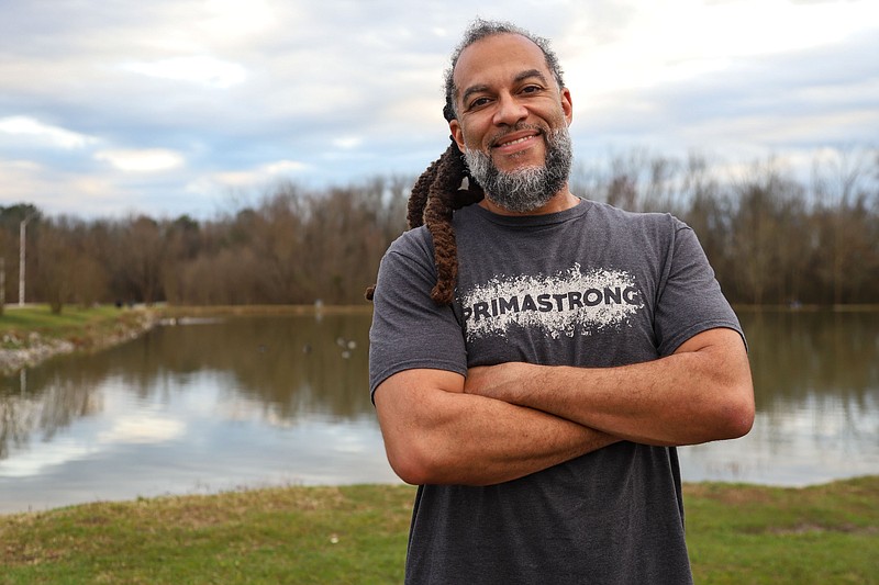 Staff Photo by Olivia Ross  / Shane Terry poses for a photo at Camp Jordan on Feb. 21. Terry, who lives in Orchard Knob, restored his voting rights in 2020 after losing them due to a felony conviction.