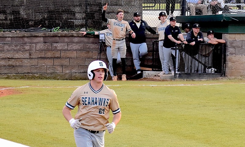 Staff photo by Patrick MacCoon / Silverdale Baptist senior Brody Lamb (28) runs down the first-base line as he watches his home run sail into the street, just two batters after Owen Phillips (3) also homered in Thursday's win over visiting Signal Mountain.
