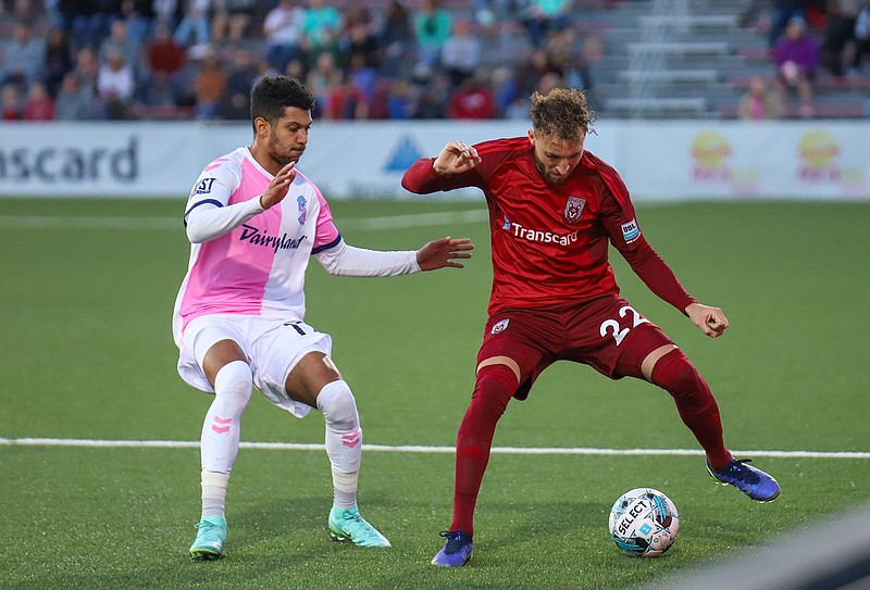 Staff photo by Olivia Ross / Defender Aaron Lombardi, right, is among the returning players this year for the Chattanooga Red Wolves, who open their 2023 USL League One schedule Saturday night.