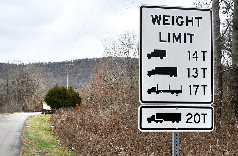 Staff Photo by Robin Rudd / A weight limit sign, seen Feb. 17, informs motorists of the carrying capacity of the Yates Spring Road Bridge, over Little Chickamauga Creek in Catoosa County, Ga.