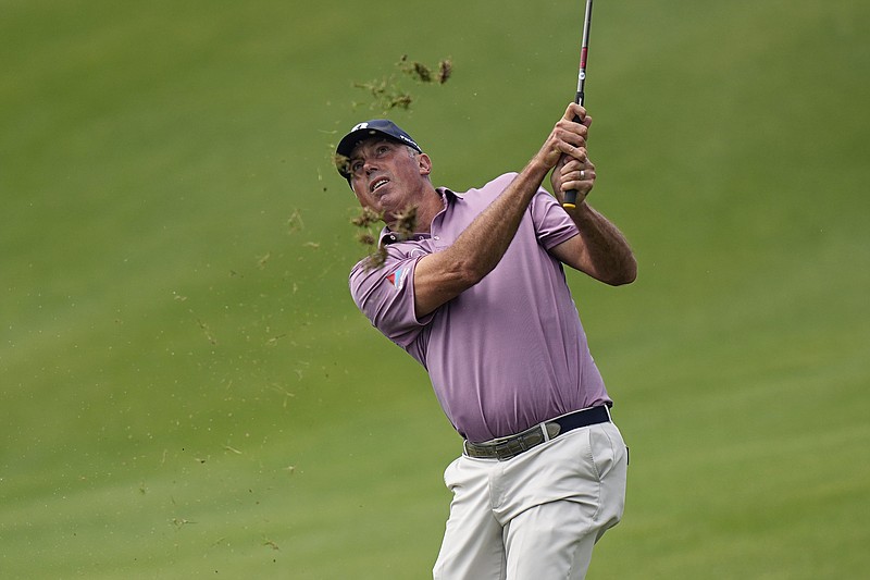 AP photo by Eric Gay / Matt Kuchar hits from the fairway on the sixth hole at Austin Country Club during the third day of the WGC-Dell Technologies Match Play on Friday in Texas.