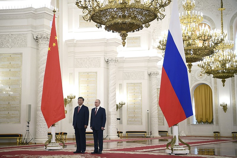 File photo/Alexey Maishev, Sputnik, Kremlin Pool Photo via AP / Russian President Vladimir Putin, right, and Chinese President Xi Jinping attend an official welcome ceremony at The Grand Kremlin Palace, in Moscow, Russia, on March 21, 2023.