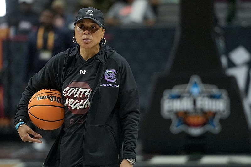 AP photo by Darron Cummings / South Carolina women's basketball coach Dawn Staley watches as her team practices Thursday in Dallas, where they'll take on Iowa in the Final Four on Friday night.