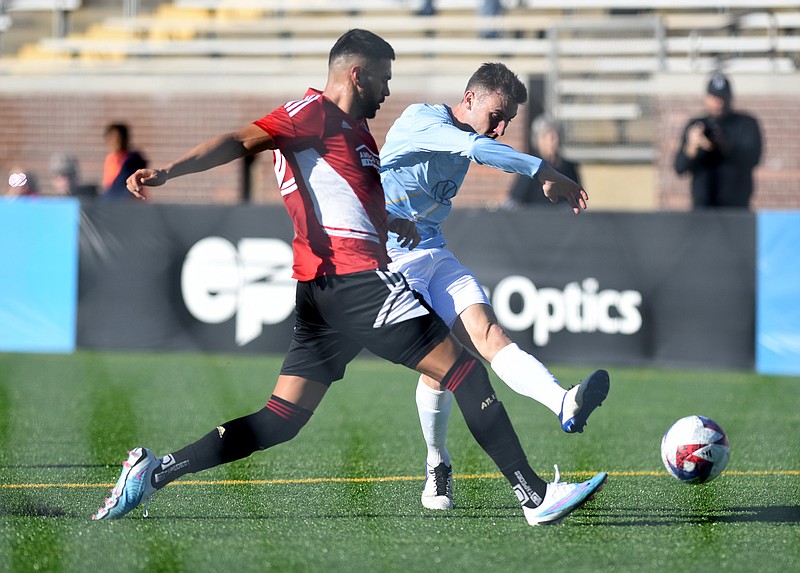 Staff photo by Matt Hamilton / Chattanooga FC's Alex McGrath, right, kicks the ball during a preseason exhibition against MLS club Atlanta United FC on Jan. 28 at Finley Stadium. CFC will be back at Finley on Saturday aternoon to open its 2023 league schedule against new NISA member Gold Star FC Detroit.