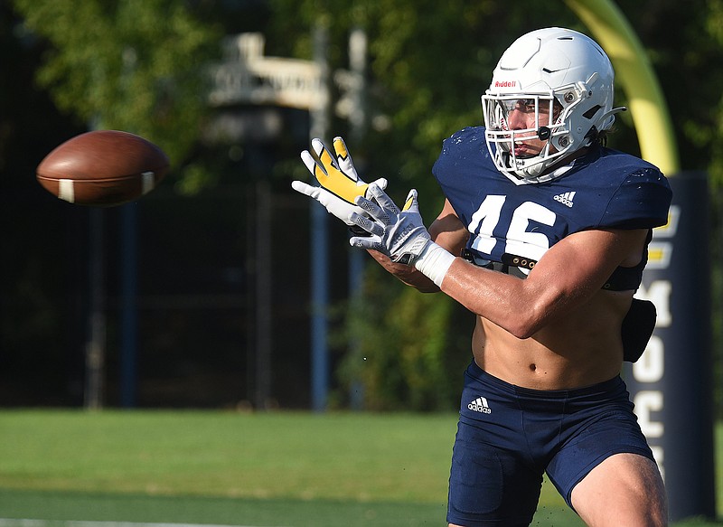 Staff file photo by Matt Hamilton / Ty Boeck, a UTC linebacker the past five seasons after a standout prep career at Soddy-Daisy, returned to the Mocs' Scrappy Moore Field on Friday for the program's pro day. Boeck starred on defense for the Mocs, but he could play on offense at the next level.